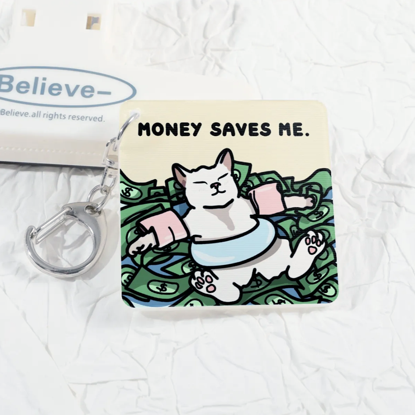 (limited) "i don't save money, money saves me" lenticular keychain