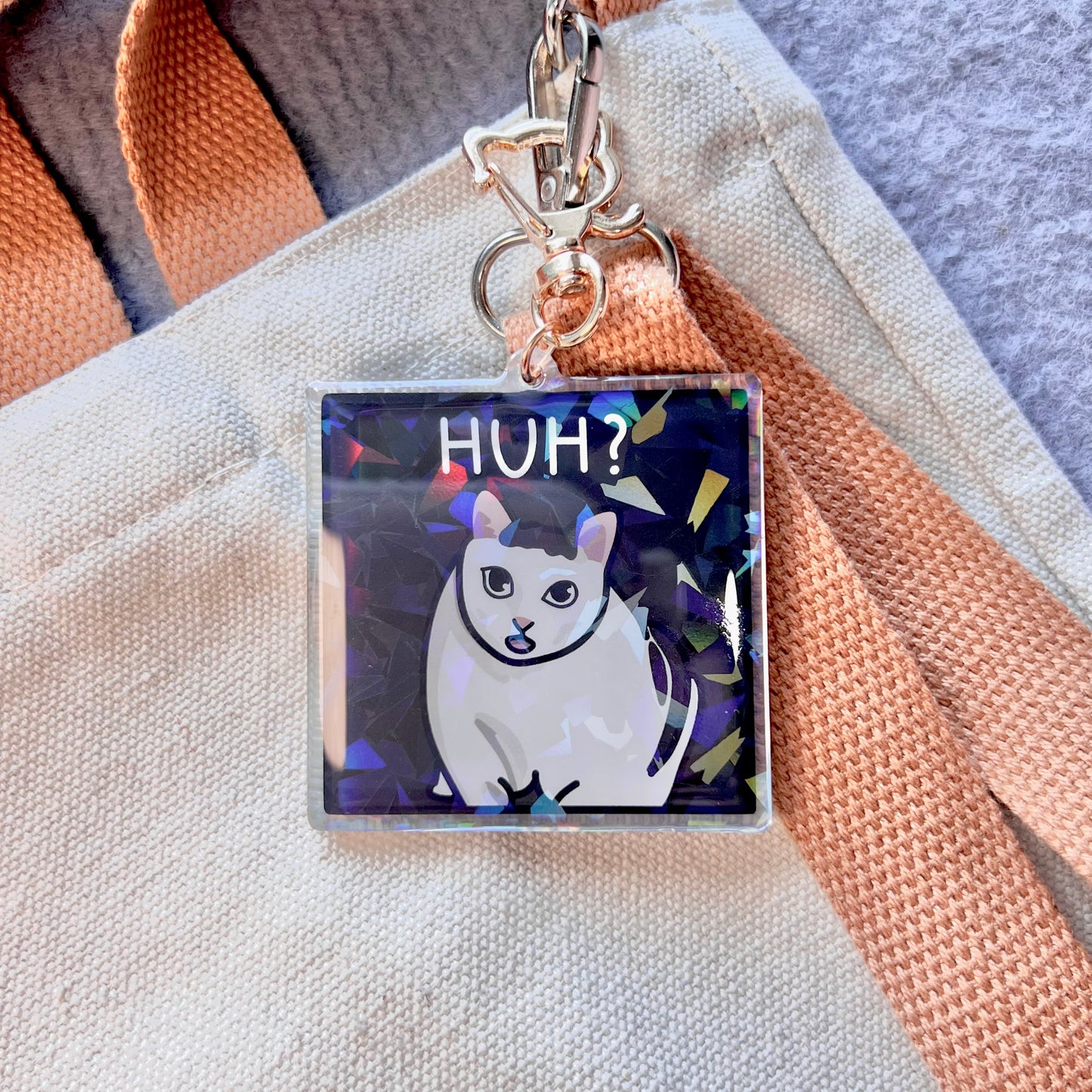 "huh" keychain