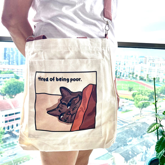 "tired of being poor" tote bag