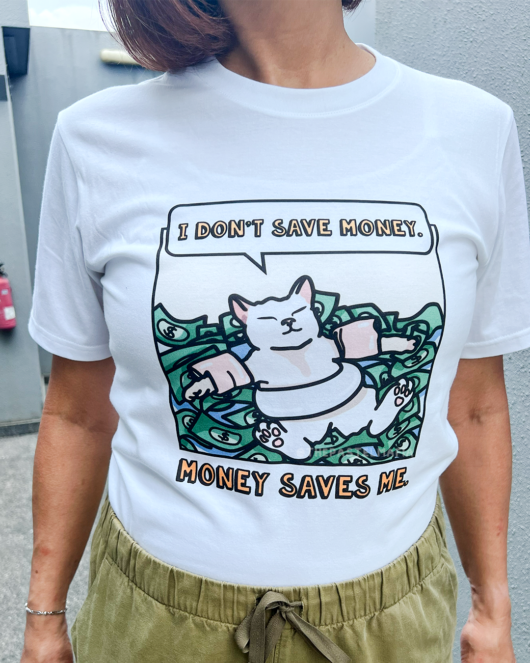 (limited) "i don't save money. money saves me." cat meme graphic t-shirt