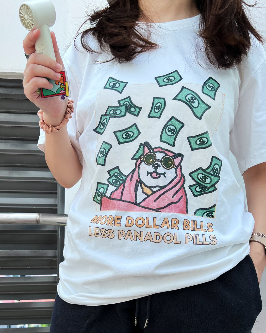 "more dollar bills less panadol pills" cat meme graphic t-shirt